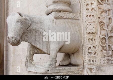 One of statues of hippos at the entrance to St. Nicholas Basilica in Bari, Apulia, Italy. The basilica was founded in XI century Stock Photo