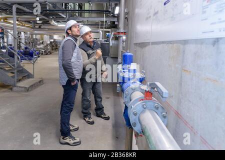 portrait of a workers on pipe plant Stock Photo