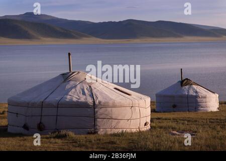 Mongolia, Arkhangai province, near Tariat, two yurts at dusk, by Terkhiin Tsagaan lake, altitude 2079 m Stock Photo