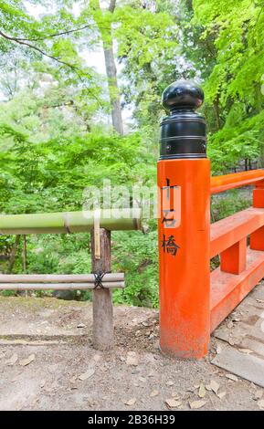 KYOTO, JAPAN - MAY 17, 2017: Pillar of Juichibashi Bridge in Fushimi Inari Taisha Shinto Shrine in Kyoto, Japan. Shrine was founded in 711 and is famo Stock Photo