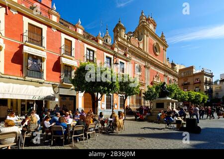 Spain, Andalusia, Seville, Alfalfa district, Plaza del Salvador (Savior Square), terrace of a tapas bar in front of the Iglesia del Salvador (Holy Savior Church) Stock Photo