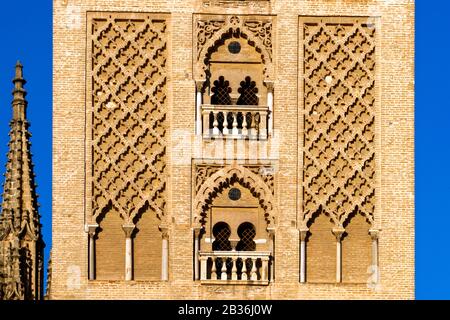Spain, Andalusia, Sevilla, la Giralda Tower, former Almohad minaret of the Great Mosque converted into cathedral steeple, listed as World Heritage by UNESCO Stock Photo