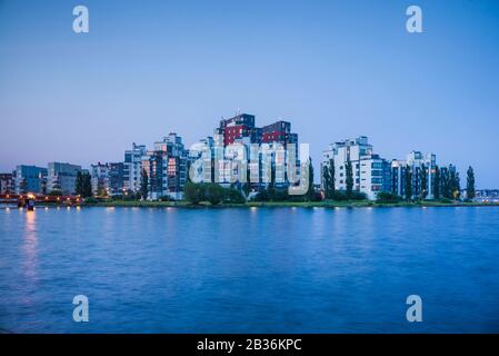 Sweden, Vastmanland, Vasteras, new residential buildings of the Munkangen harborfront, dusk Stock Photo