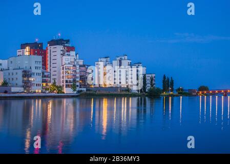 Sweden, Vastmanland, Vasteras, new residential buildings of the Munkangen harborfront, dusk Stock Photo