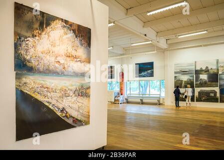 Sweden, Varmland, Karlstad, Sandgrund Karlstad, former dancehall now a gallery for famed Swedish artist Lars Lerin, interior with visitors Stock Photo