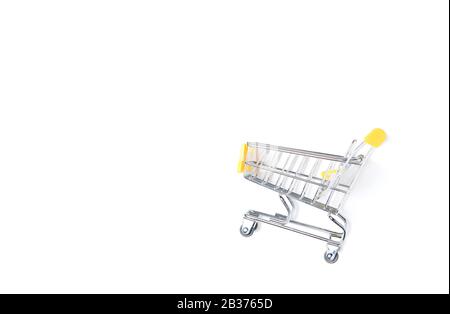 Empty shopping trolley isolated on white background with copy space Stock Photo