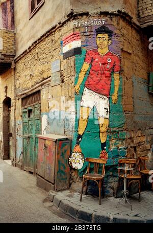 Travel Photography - Football street art of Egypt footballer Trezeguet in Islamic Cairo in the city of Cairo in Egypt in North Africa Stock Photo