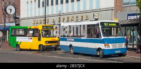 Archive historical image First Eastern National & Clintona single decker public transport buses at bus stop in High Street Brentwood Essex England UK Stock Photo