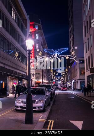 Jermyn street at night during the festive period in London, UK. Stock Photo