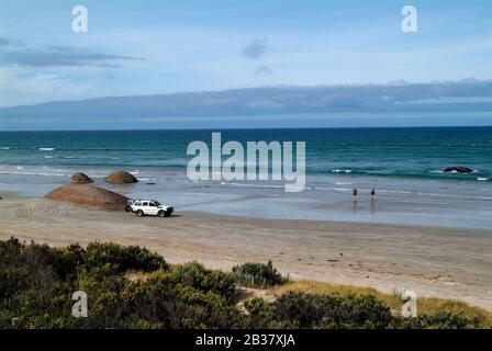 Australia, unidentified fisher man and rocks named The Granites in  Koorong Nationalpark Stock Photo