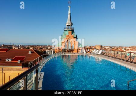 Pool on the Roof of the Hilton Molino Stucky Venice, Giudecca, Venice, Veneto, Italy. Stock Photo