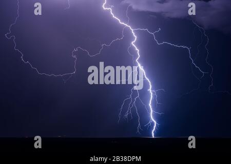 Lightning bolt strike from a storm near Willcox, Arizona Stock Photo