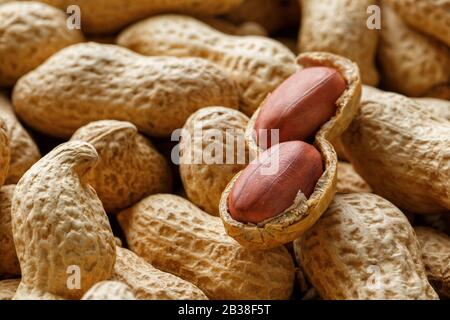 Peeled peanut on well peanuts. Peanuts, for background or textures. Stock Photo