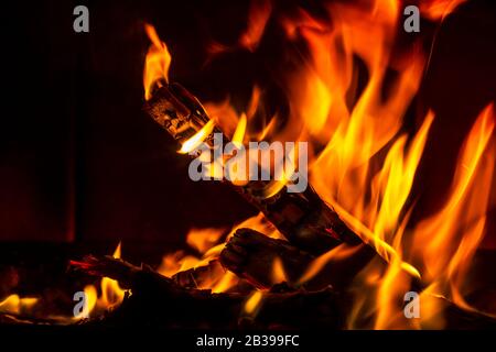 Glowing Hot Charcoal Briquettes Close-up Background Texture Stock Photo