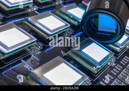 Test several oled displays of white color on the test station. Displays glow brightly of white color close up. Stock Photo