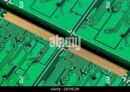 Close up photo of green pcb printecd circuit board electric paths Stock Photo