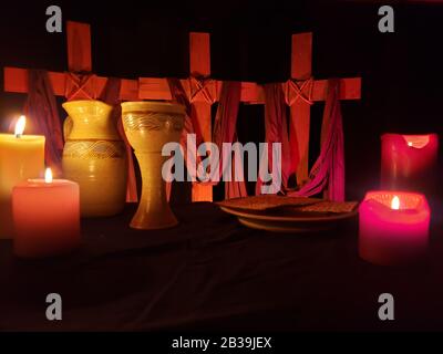 Holy Week With Communion Set and Candles on Black table01 Stock Photo