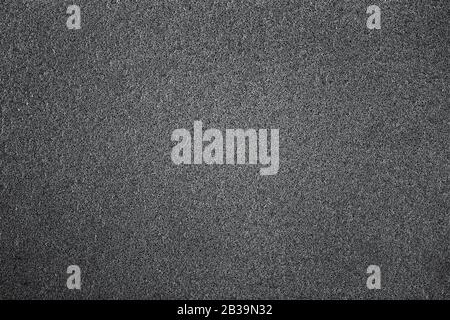 Abstract porous dark grey texture for design background, copy space Stock Photo