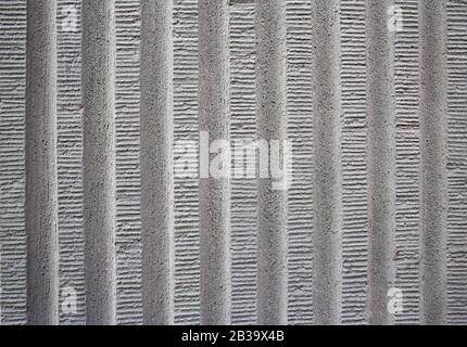 Striped gray concrete exterior wall Stock Photo