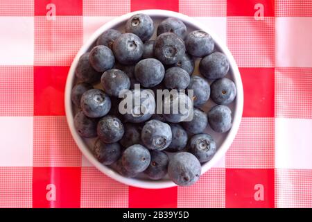 top view of blue berry on plate on table  Stock Photo