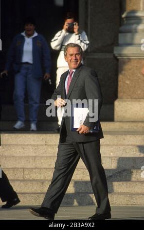 Austin, Texas USA, Dec. 6, 2000: Texas Governor and possible U.S. president-elect George W. Bush greets well-wishers outside the Texas Capitol as he walks to  his office inside the Capitol. Bush has been keeping an eye on the Supreme Court case that will decide the Florida recount and possibly decide the presidential election. ©Bob Daemmrich Stock Photo