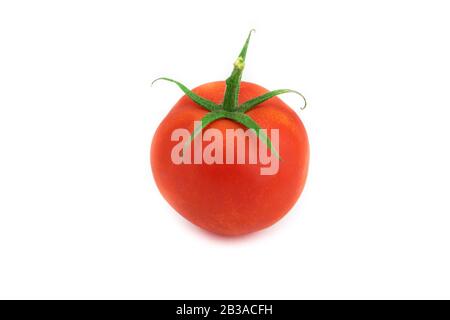 Ripe fresh organic tomato isolated on white background. Stock Photo