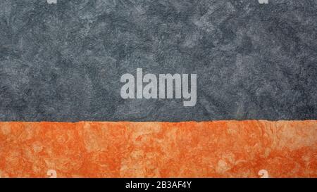 gray and orange - abstract landscape created with colorful sheets of handmade textured paper Stock Photo