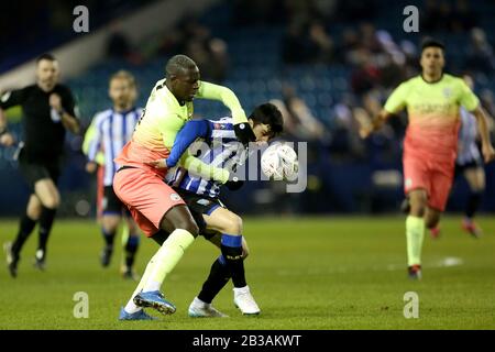 SHEFFIELD, ENGLAND - MARCH 4TH Manchester City's Benjamin Mendy battles with Sheffield Wednesday's Fernando Forestieri during the FA Cup Fifth Road match between Sheffield Wednesday and Manchester City at Hillsborough, Sheffield on Wednesday 4th March 2020. (Credit: Mark Fletcher | MI News) Photograph may only be used for newspaper and/or magazine editorial purposes, license required for commercial use Credit: MI News & Sport /Alamy Live News Stock Photo