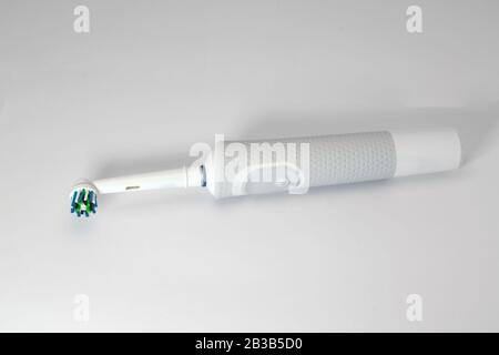 Electric toothbrush isolated on a white background. Stock Photo