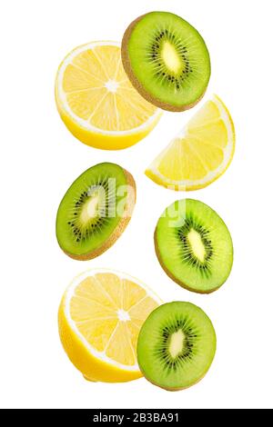 Falling kiwi and lemon isolated on white background. Stock Photo