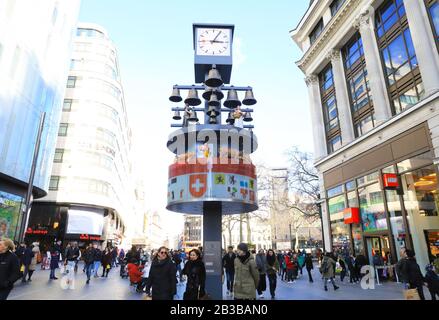 The historical Swiss Glockenspiel on Leicester Square, in London's West End, in the UK Stock Photo