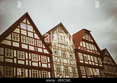Cute historical half-timbered houses in downtown of Melsungen, Germany. Stock Photo