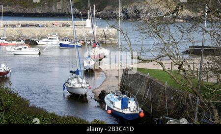 CEMAES, ANGLESEY, WALES - 2020: Cemaes Harbour and boats in Anglesey Wales UK Stock Photo