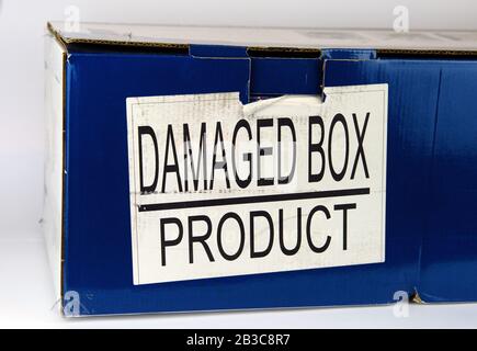 Retail cardboard box with the large label "Damaged Box Product". Stock Photo