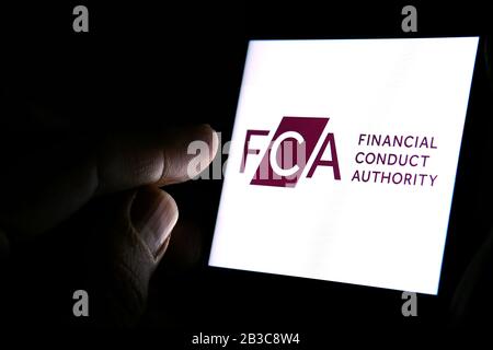 Financial Conduct Authority logo on a phone screen Stock Photo - Alamy