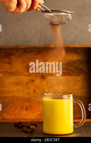 Golden milk made with turmeric and other spices Stock Photo