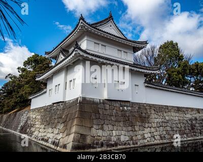 White guard house and moat surrounding Nijo Castle in Kyoto, Japan. Stock Photo