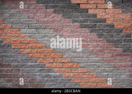 Samples multicolored facing bricks on the stand. Construction Materials Stock Photo