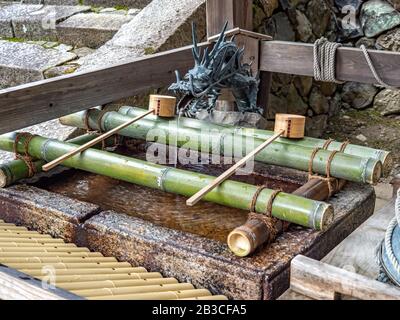 Chozua basin at Shinto Shrine for washing hands and mouth to purify before approaching shrine. Stock Photo