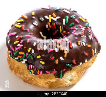 Chocolate glazed donut with sprinkles on a white background Stock Photo