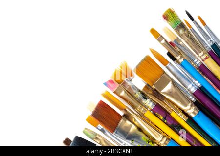 A collection of artists paint brushes on a white background Stock Photo