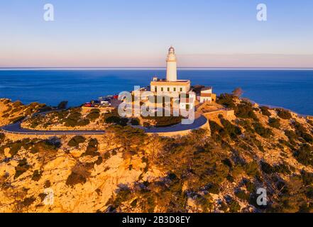 Lighthouse at Cap Formentor in the morning light, Formentor peninsula, near Pollenca, aerial view, Majorca, Balearic Islands, Spain Stock Photo