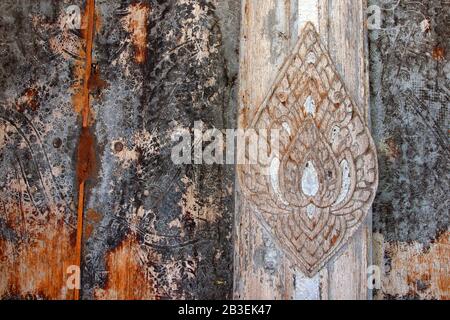 close up of carved door in buddhist temple Stock Photo