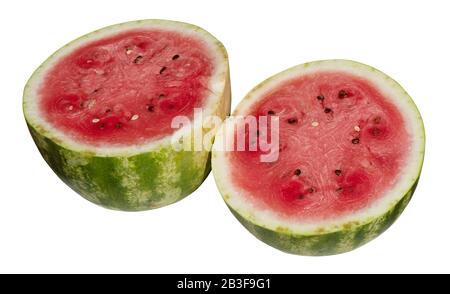 A juicy, red ripe watermelon (Citrullus lanatus) is cut in half and is isolated on a white background Stock Photo