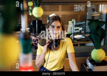 Berlin, Germany. 02nd Mar, 2020. Podcast presenter Shalin Rogall in the podcast studio at Deutschlandfunk Nova. Podcasts, quasi radio on demand, are now available in a wide variety of variations. (to dpa 'To relax, to think, to clean: podcasts are booming') Credit: Carsten Koall/dpa/Alamy Live News Stock Photo