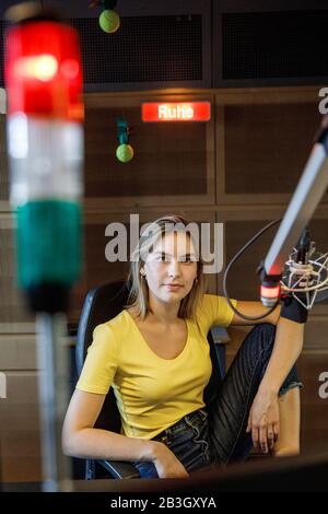 Berlin, Germany. 02nd Mar, 2020. Podcast presenter Shalin Rogall in the podcast studio at Deutschlandfunk Nova. Podcasts, quasi radio on demand, are now available in a wide variety of variations. (to dpa 'To relax, to think, to clean: podcasts are booming') Credit: Carsten Koall/dpa/Alamy Live News Stock Photo