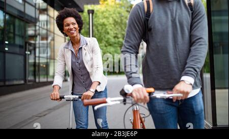 Happy people eco transport city bicycle fun concept Stock Photo