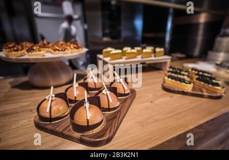 BEIJING, СHINA - JUNE 01, 2019: Confectionery performed by Chinese chefs in traditional cuisine. Stock Photo