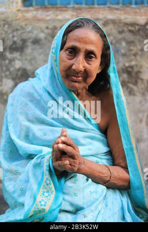 Indian grandmother in blue saree Stock Photo