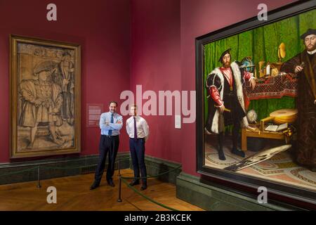The National Gallery, London, UK. 2nd March 2020. (Image EMBARGOED until 09.30am Thursday 5th March 2020). Holbein’s fragile Henry VIII portrait on paper (left), from The National Portrait Gallery, goes on display alongside Holbein’s The Ambassadors at The National Gallery. Image: Dr Gabriele Finaldi, Director of The National Gallery and Dr Nicholas Cullinan, Director of the National Portrait Gallery  between Holbein’s Henry VIII and Henry VI and The Ambassadors at the new Holbein display at the National Gallery, London. Credit: Malcolm Park/Alamy Live News. Stock Photo